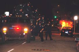 Only when Oaklands rage over the execution of Oscar Grant broke out into a full rebellion on Wednesday, Jan. 7, did authorities, after nearly a week of silence, take this police murder seriously. Still, Oakland youth took the brunt as police used military equipment such as this tank-like hummer to put down the rebellion  while Mayor Ron Dellums promised police restraint.  Photo: Brooke Anderson, IndyBay
