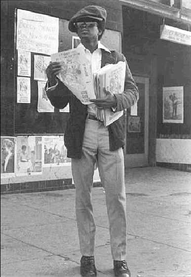 Panther selling newspapers